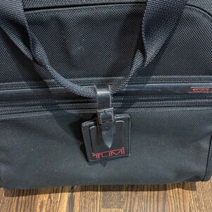 in great condition Tumi roller bag